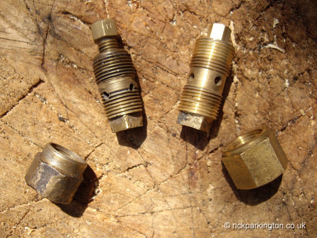 Original AMAC jet holder on left, replacement to take AMAL jets, right
