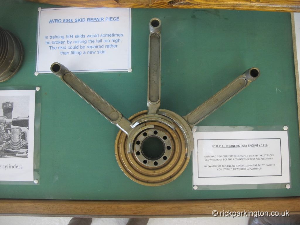 Close up of a roatary engine crankdshaft assembly displayed in a case